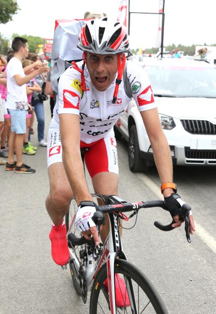 Guillaume Di Grazia of Eurosport participating in a charity cycling event during the Tour de France.