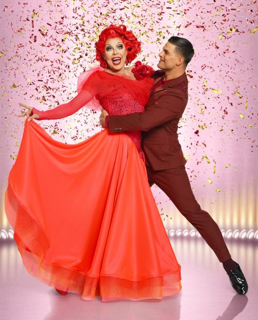 La Voix and Ajaz Skorjanec posing for a dance photo with confetti falling around them.