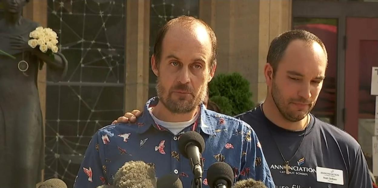 Father of school shooting victim at press conference.