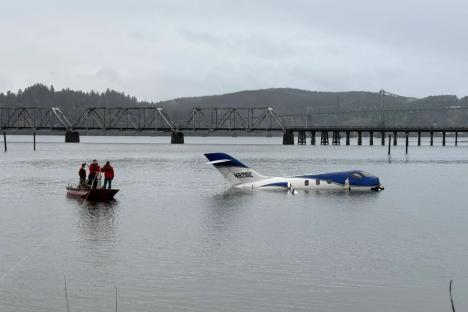 Private jet skids off airport runway and splashes down in river as nightmare landing sends passengers to hospital