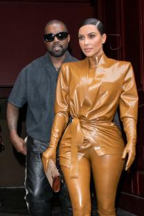 Kim Kardashian and Kanye West leaving a fashion show in Paris.