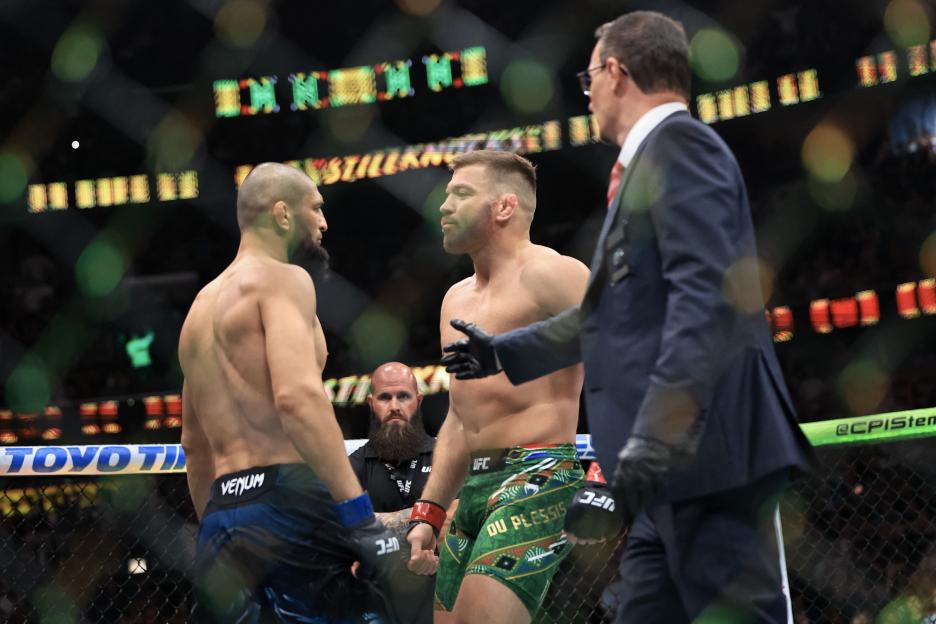 Dricus du Plessis and Khamzat Chimaev facing off at a UFC press conference.