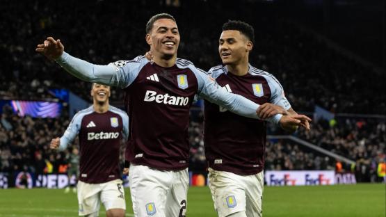 Aston Villa players celebrating a goal.