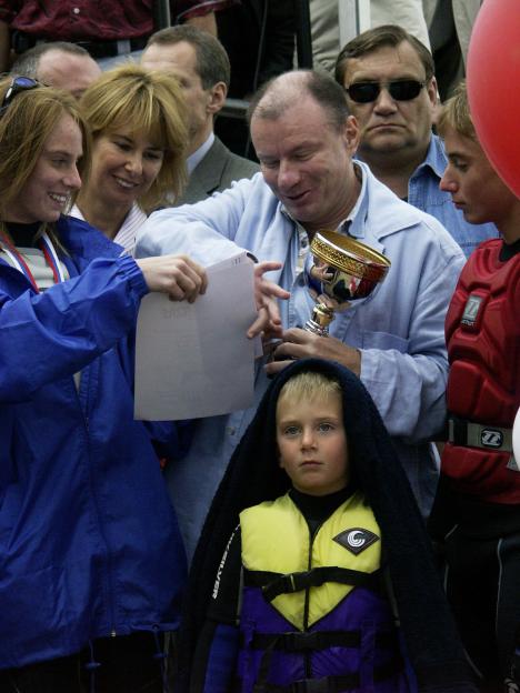Vladimir Potanin with his wife and children at an aquabike championship.