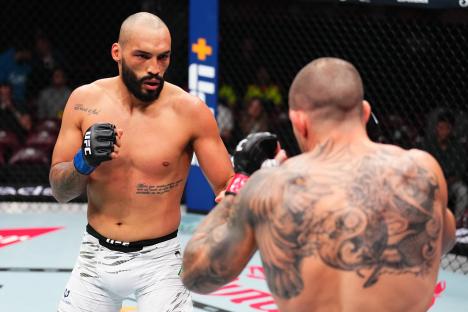 UFC fighters Bruno Silva and Marc-Andre Barriault in a match.