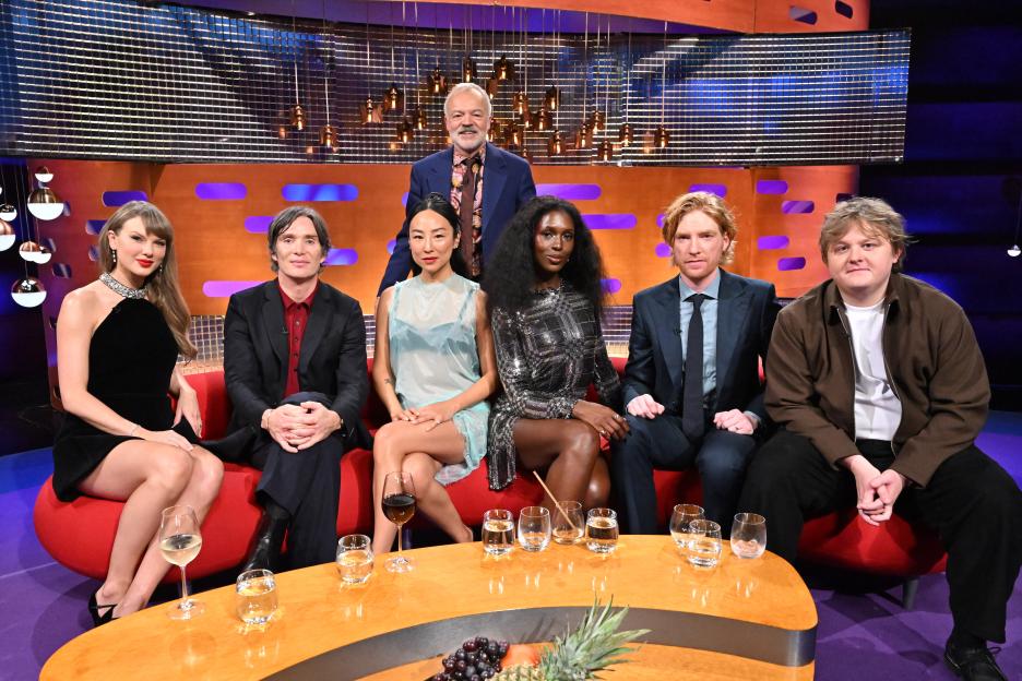 Taylor Swift, Cillian Murphy, Greta Lee, Jodie Turner-Smith, Domhnall Gleeson, and Lewis Capaldi with host Graham Norton.