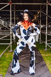 Jade Thirwall at Mighty Hoopla festival in a cow-print jumpsuit and cowboy hat.
