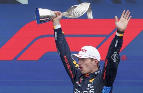 Red Bull Racing driver Max Verstappen, of the Netherlands, celebrates after his victory at the Formula 1 Canadian Grand Prix auto race in Montreal, Sunday, June 9, 2024. (Paul Chiasson/The Canadian Press via AP)