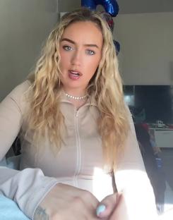 Woman with long blonde hair describing a skydiving experience.