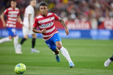 Darwin Machis of Granada CF running with the ball during a La Liga soccer match.