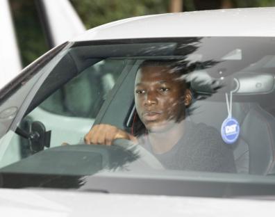 Chelsea player driving away from Cobham training ground.