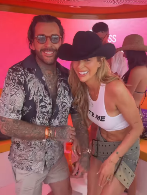 Two people smiling for a photo.