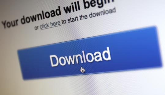 Close-up of a computer screen showing a download button.
