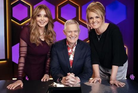 Promotional photo of the hosts of Celebrity Puzzling, a game show hosted by Jeremy Vine.