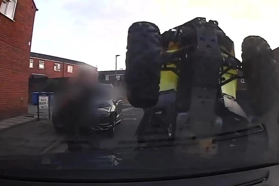 Moment ‘thief’ rams quad bike into police car sending it flipping into air before landing upside down