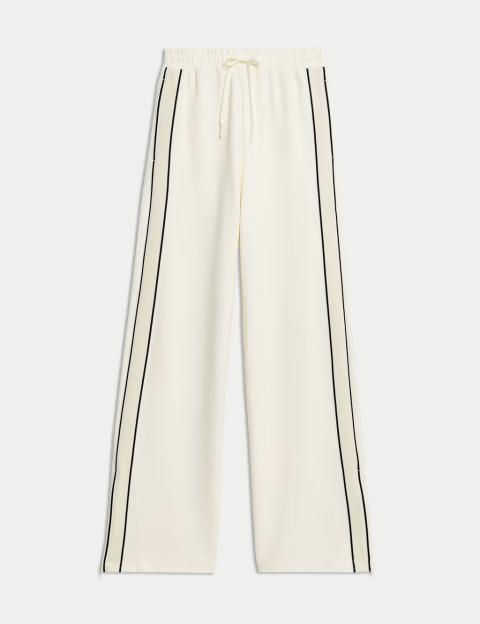 Wide-leg trousers with side stripes.