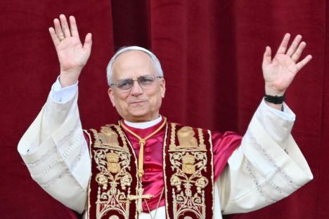 Newly elected Pope Leo XIV, Robert Prevost, waving to the crowd.