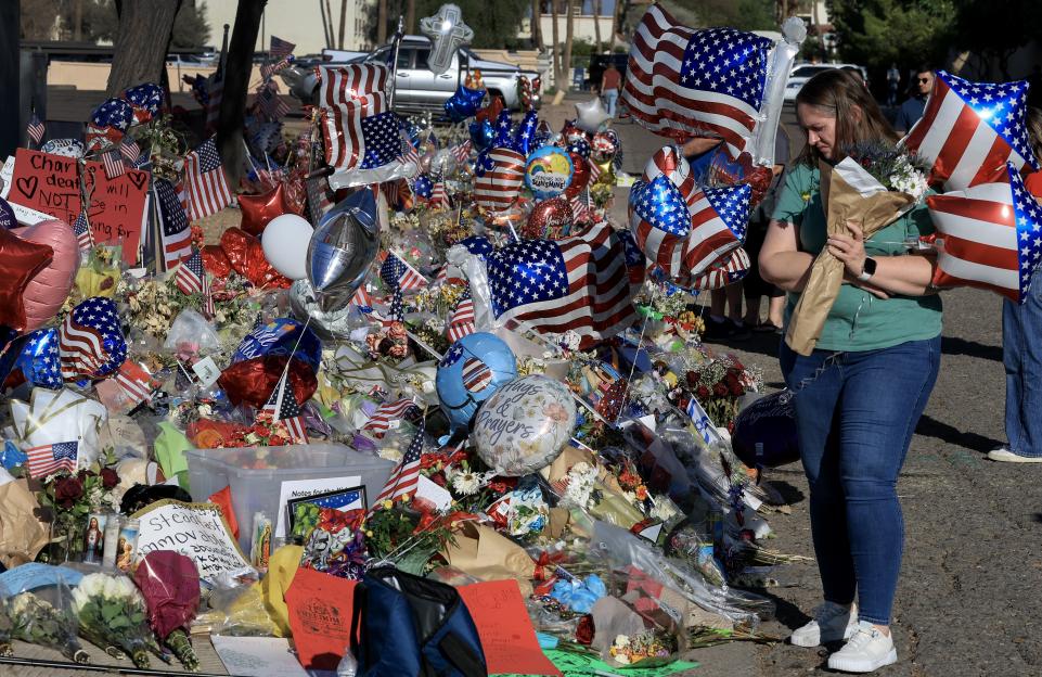 Erin Noriga visits the memorial for Charlie Kirk at Turning Point USA headquarters.