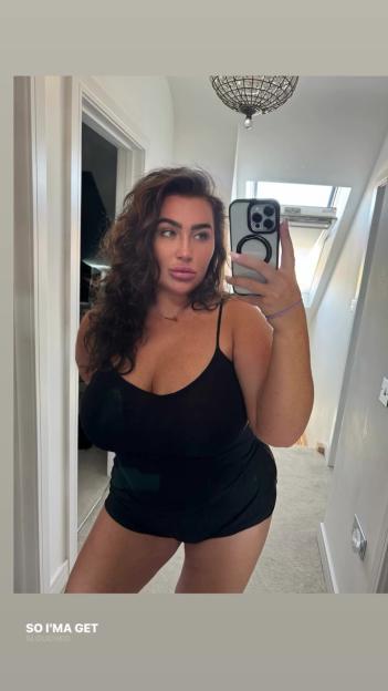 Lauren Goodger selfie in black top and shorts.