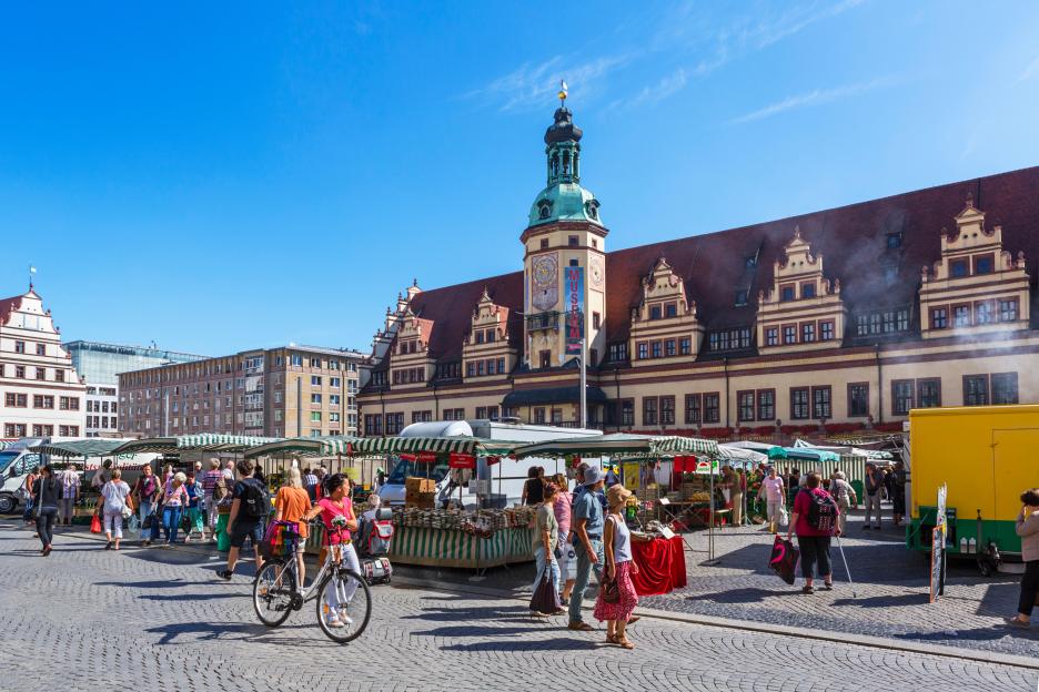 Market in the Markt (Market Square) in front of the Altes Rathaus (Old Town Hall) in Leipzig, Germany.