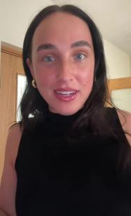 Woman reviewing a perfume dupe.