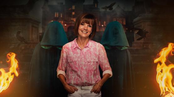 a woman in a pink shirt stands in front of a group of ghosts
