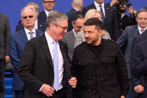 Keir Starmer and Volodymyr Zelensky speaking at a summit.