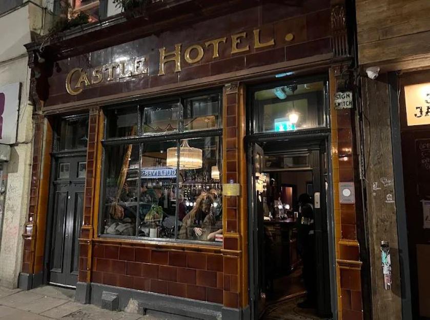 Castle Hotel pub at night.
