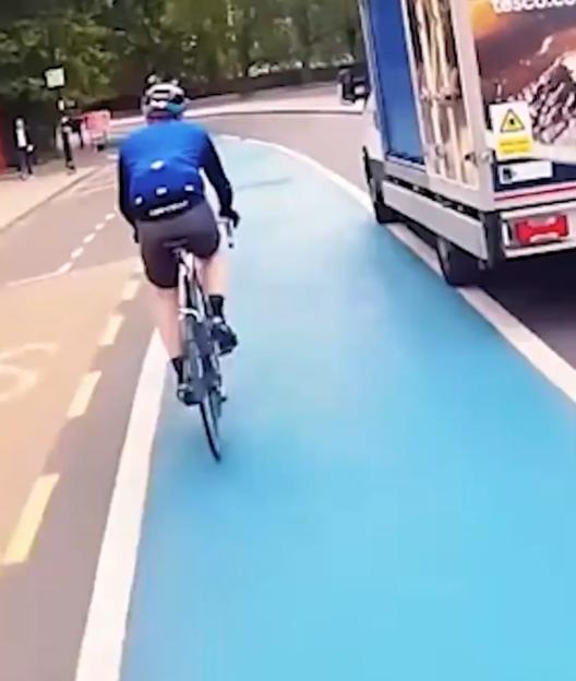 Moment Tesco van rams into cyclist while turning left across bike lane… but some viewers can’t decide who’s wrong