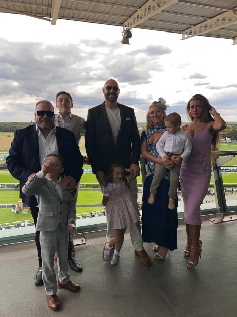 Tyson Fury with his family at the horse races.
