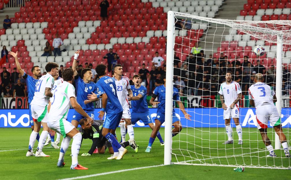 Israel soccer players appeal for a goal.