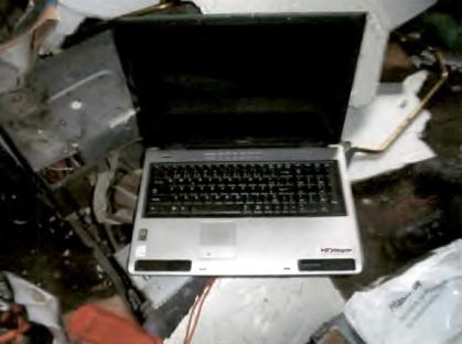 Laptop computer found at a box factory.