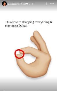 Illustration of a hand gesture indicating closeness to moving to Dubai.