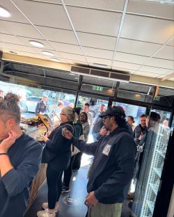 Romesh Ranganathan at a bakery.