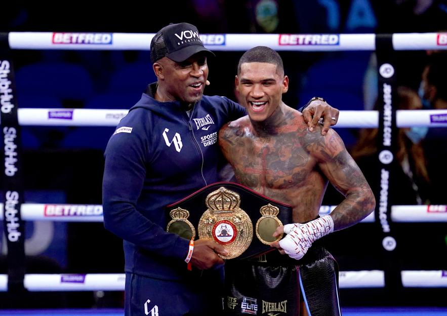 Conor Benn celebrates with his dad Nigel Benn after winning the WBA Continental Welterweight Title.
