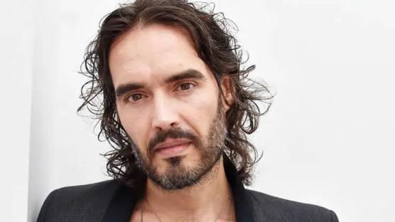 Popular British actor, Russell Brand charged with rape, assault