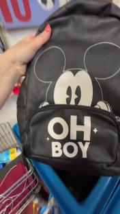 Black Mickey Mouse backpack that says