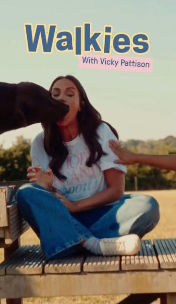 Vicky Pattison letting her dog lick her face.