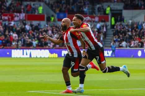 Brentford players celebrating a goal.