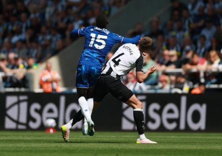 Chelsea's Nicolas Jackson fouling Newcastle United's Sven Botman.