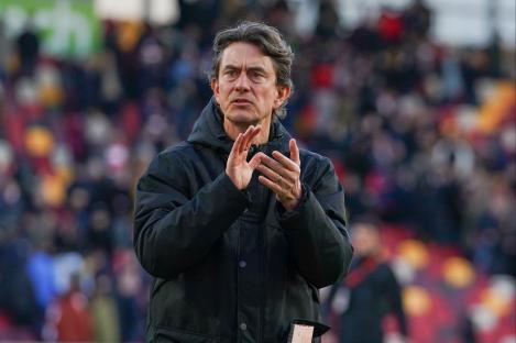 Brentford manager Thomas Frank applauding.