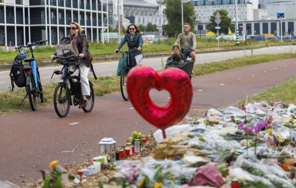 Tributes at a cycle path where a teenager was murdered.