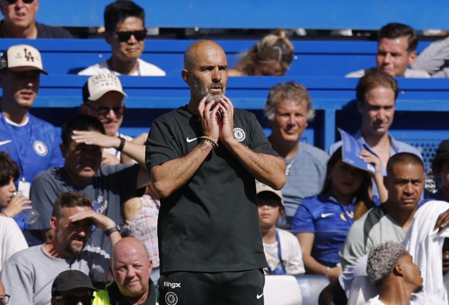 Chelsea manager Enzo Maresca watches a soccer match.