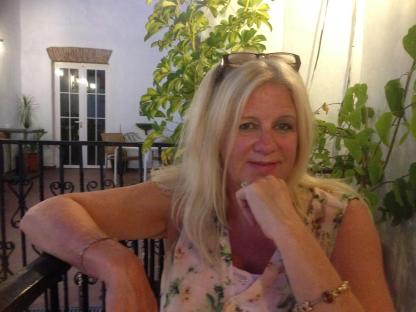 Portrait of Heather Garcia, a businesswoman and traveler.