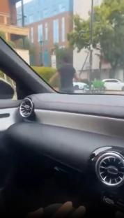 Street fight: a driver runs over a cyclist.