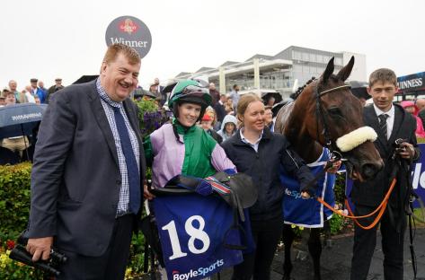Hallowed Star with jockey Rachael Blackmore and winning trainer John Joseph Hanlon (left) after winning the BoyleSports Handicap Hurdle during day six of the Galway Races Summer Festival 2022 at Galway Racecourse in County Galway, Ireland. Picture date: Saturday July 30, 2022.
