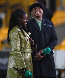 Eni Aluko and Ian Wright sharing a joke while working for ITV sport.