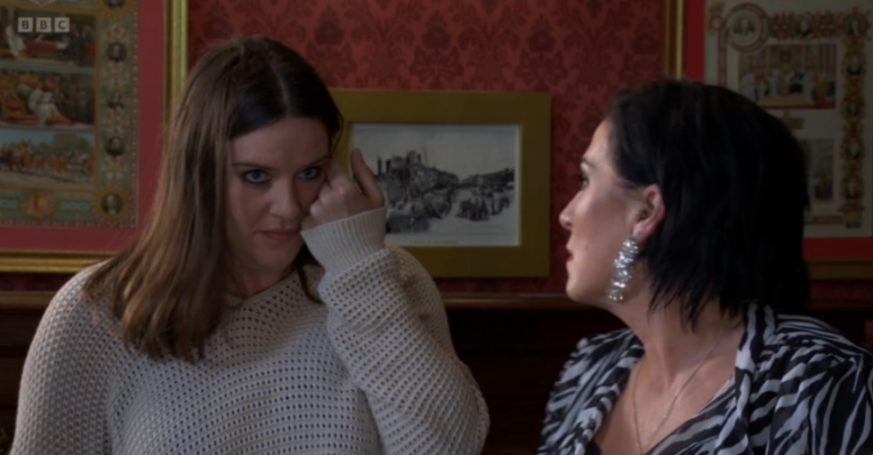Zoe Slater looking at Sharon Watts after being slapped.