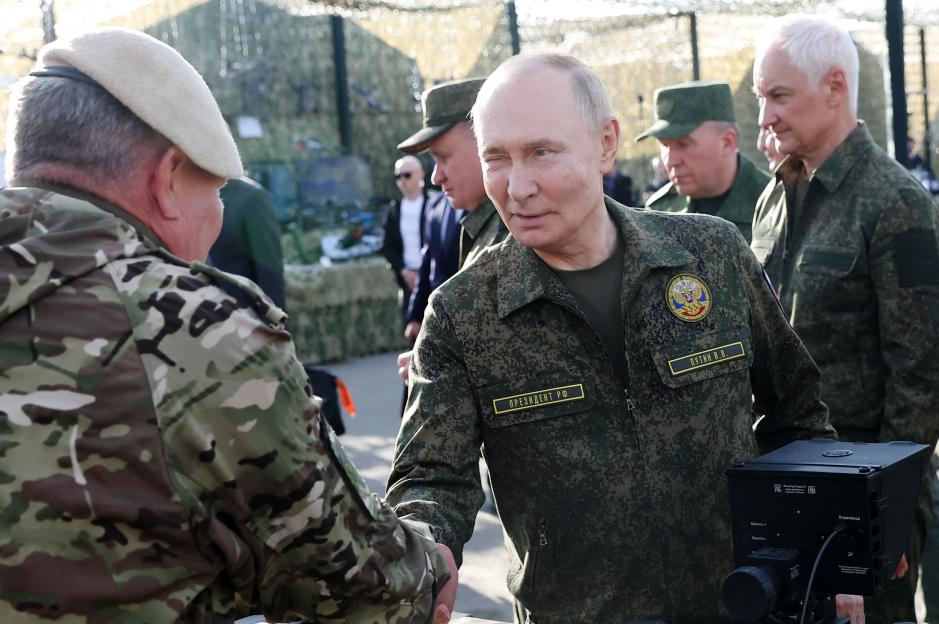 Russian President Vladimir Putin inspecting military equipment at the "Zapad-2025" military drills.