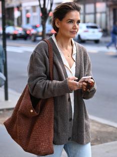 NEW YORK, NEW YORK - OCTOBER 10: Katie Holmes is seen on her way to the theatre in jeans and a Dune London bag on October 10, 2024 in New York City. (Photo by Michael Simon/WireImage)